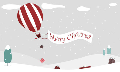 Fototapeta na wymiar Merry Christmas - Geschenkkarte, Weihnachtswichtel fliegt in Heißluftballon über Winterlandschaft und wirft Geschenke ab, Banner