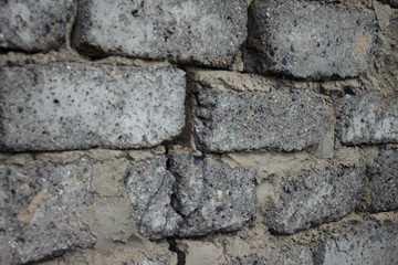 Old wall cracked from bricks