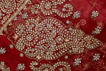 wonderful Indian traditional wedding sari in red with sequins