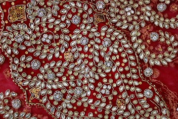 wonderful Indian traditional wedding sari in red with sequins