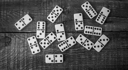 Domino pieces on wooden Background