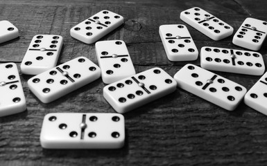 Domino pieces on wooden Background
