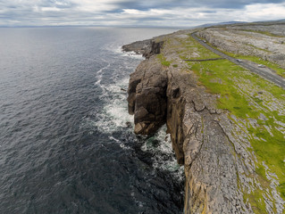 Aerial drone view, landscape in Burren region, county Clare  Ireland. Mini cliffs and Atlantic...