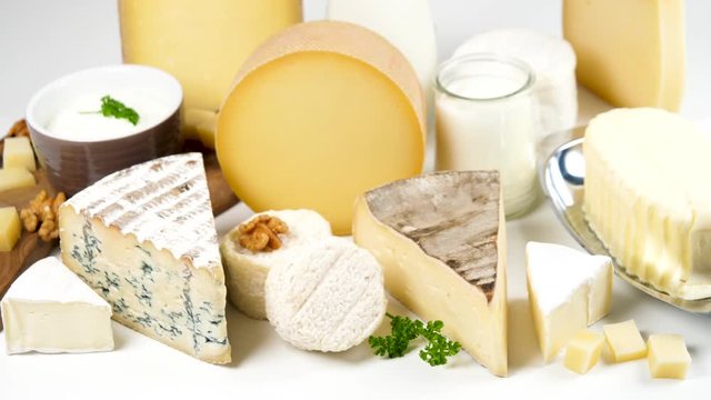 collection of dairy products on white background- milk,yogurt,cheese,butter