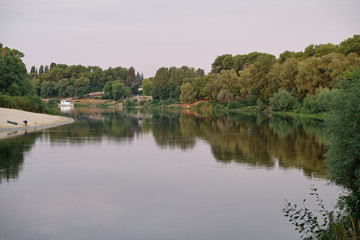 Fototapeta na wymiar River and trees in the morning