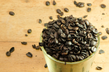 Roasted coffee beans in a cup 