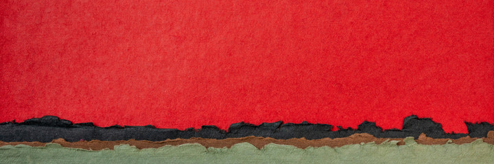 paysage abstrait rouge et vert dans des tons pastel - une collection de papiers indiens colorés faits à la main produits à partir de tissu de coton recyclé, bannière web panoramique