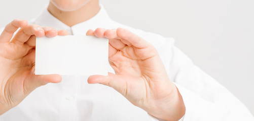  close-up portrait of a young businesswoman with Blank Business Card
