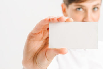  close-up portrait of a young businesswoman with Blank Business Card