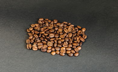 Coffee beans on black background and a place for an inscription.jpg