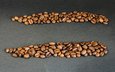 Coffee beans on black background and a place for an inscription.jpg
