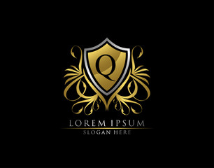 Gold Royal Shield Q Letter Logo. Graceful Elegant gold shield icon design.