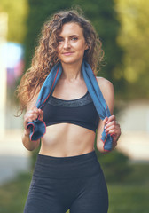 Fototapeta premium young woman resting after workout