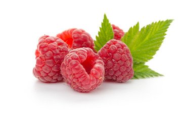  raspberries with leaf isolated on a white background