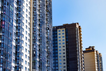 New multi-storey colored house in the city. The family bought the apartment on credit.