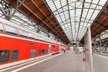 Trainstation with red train in Luebeck, germany