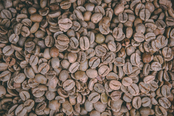 Collection of white coffee and black coffe beans