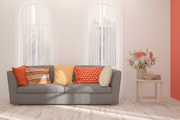 Coral stylish minimalist room with sofa. Scandinavian interior design. 3D illustration
