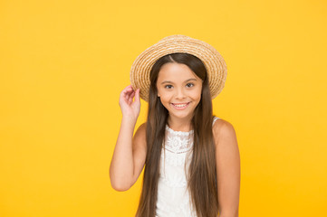 Summer travel. Vacation mood. Tropical tour. Sale and discount. Goods for kids. Adorable little girl wearing elegant hat. Have funny summer holiday. Summer tour. Leisure and entertainment concept