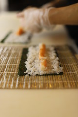 Roll the sushi