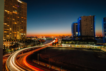 Fototapeta na wymiar night traffic in Miami Florida usa panorama sunset 