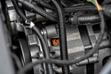 Fototapeta na wymiar Alternator of a modern car engine