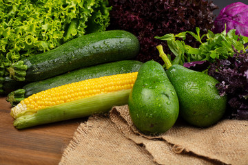 Fresh organic vegetables on wooden background. healthy eating concept. food background.