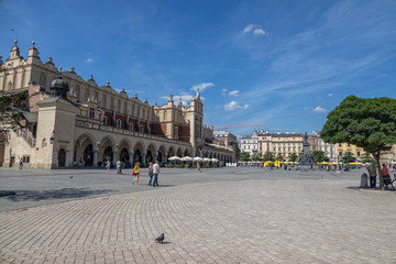 historic old town square in Krakow on a warm summer holiday day