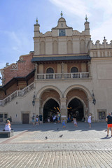 historic old town square in Krakow on a warm summer holiday day