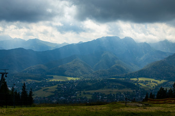 Fototapeta na wymiar landscape of the Tatra Mountains and Giewont Gubałówka on a warm summer cloudy holiday day