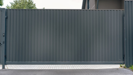 gray iron empty gate exterior front view