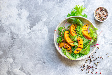 salad peach grilled lettuce leaves mix nectarine ingredient natural serving size healthy top view place for text copy space keto or paleo diet raw