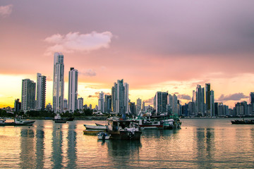 Fototapeta na wymiar Panama canal city bay skyline sunset night boats 