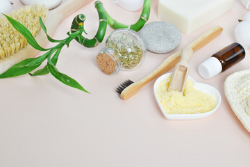 Bath Accessories on white stone background, top view, copy space. Daily bodycare concept, organic bath products.