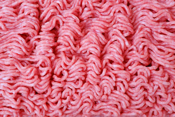 appetizing minced pork and beef lies in the factory plastic tray, raw meat products concept,...
