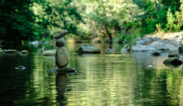 photo of stone balancing in a river landart