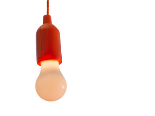Non-transparent light bulb with orange plastic lamp holder