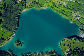 Turquoise lake in the mountains. Aerial view of Lake Tenno in autumn, Trento, Italy, Europa. Mountain lake in the alps of Italy.