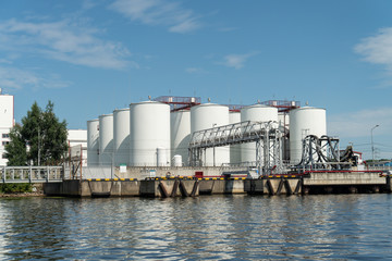industrial fuel tanks in the seaport, large Industrial tanks for petrol and oil