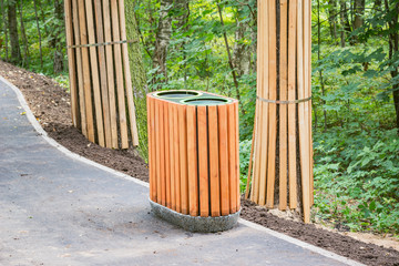 Bin for waste collection on the city park road.