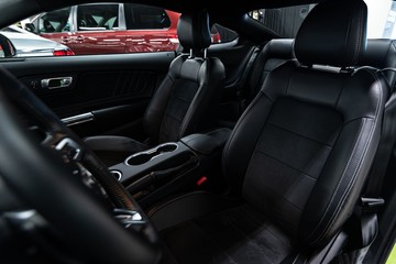 Luxury sports car black leather seats.