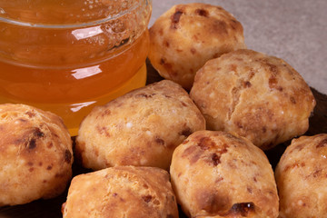 typical Brazilian snack: tapioca dumpling with honey