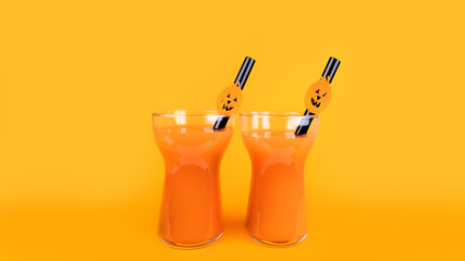 Halloween carbonated orange beverage in glass decorated with black tube and jack-o-lantern pumpkin on orange background. Homemade party Punch cocktail. Copy space