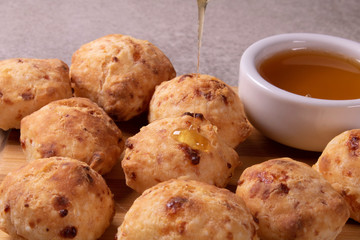 typical Brazilian snack: tapioca dumpling with honey
