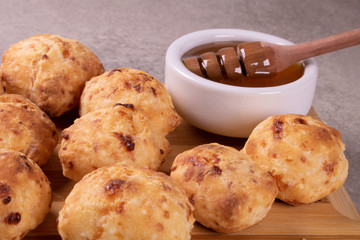 typical Brazilian snack: tapioca dumpling with honey