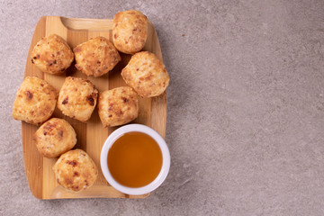 typical Brazilian snack: tapioca dumpling with honey