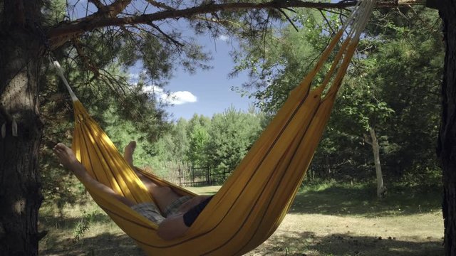 Rest on a hammock in the shade of trees