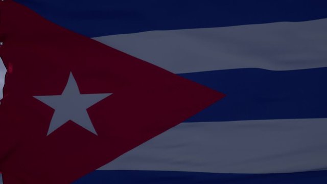 Cuba flag waving in the wind. Realistic flag background. Thundercloud background