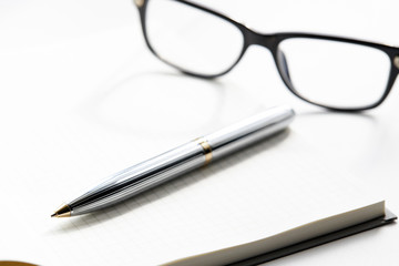 open blank diary or notebook with pan. storytelling concept. planning concept. minimal