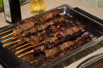 Tasty portion of beef on bamboo skewers. Ready to be savored. Beef skewers. Meat barbecue.